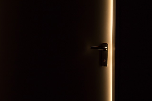 Door opening in dark room